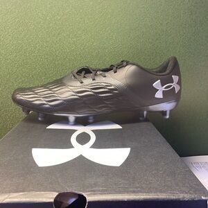 Under armour, unisex soccer cleats. New and never worn